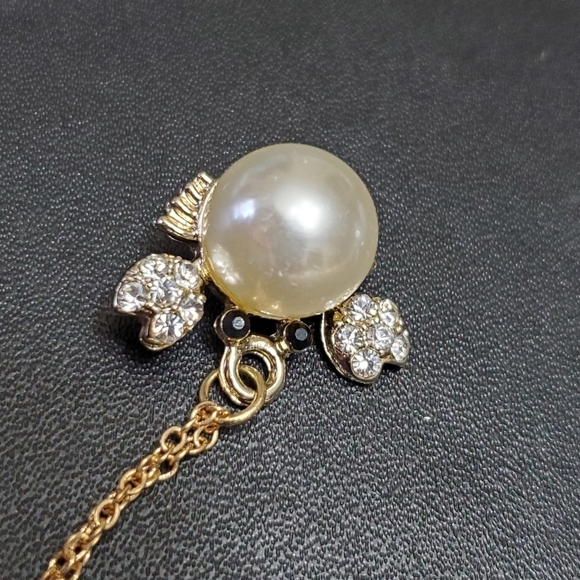 **Final Sale** Gold tone faux pearl crab necklace - Picture 5 of 8